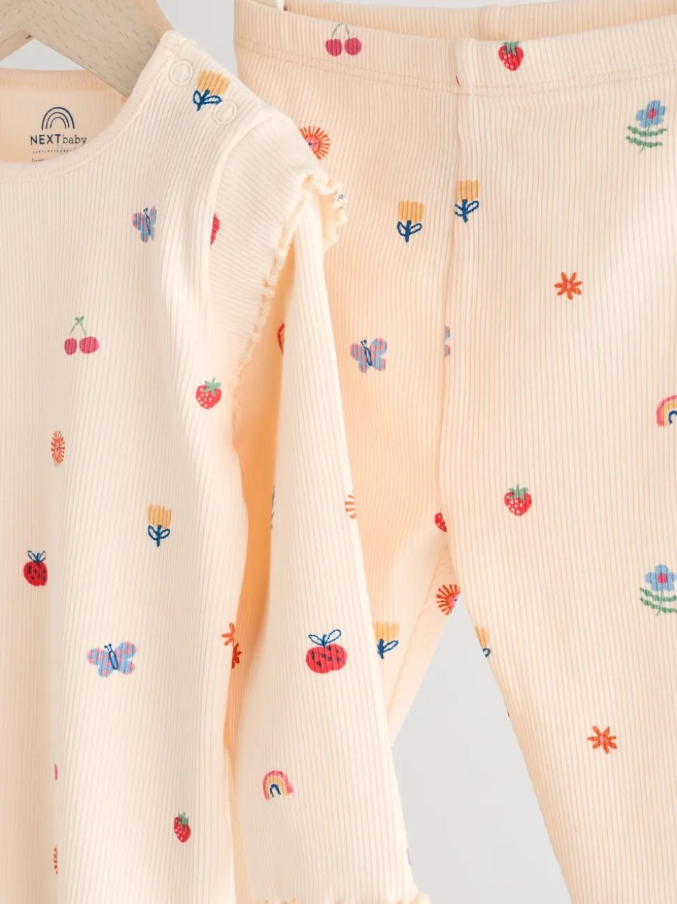 Roomkleurig met vrolijke figuurtjes - 2 -delige babyset van top en legging (0mnd -2jr)