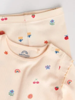 Roomkleurig met vrolijke figuurtjes - 2 -delige babyset van top en legging (0mnd -2jr)