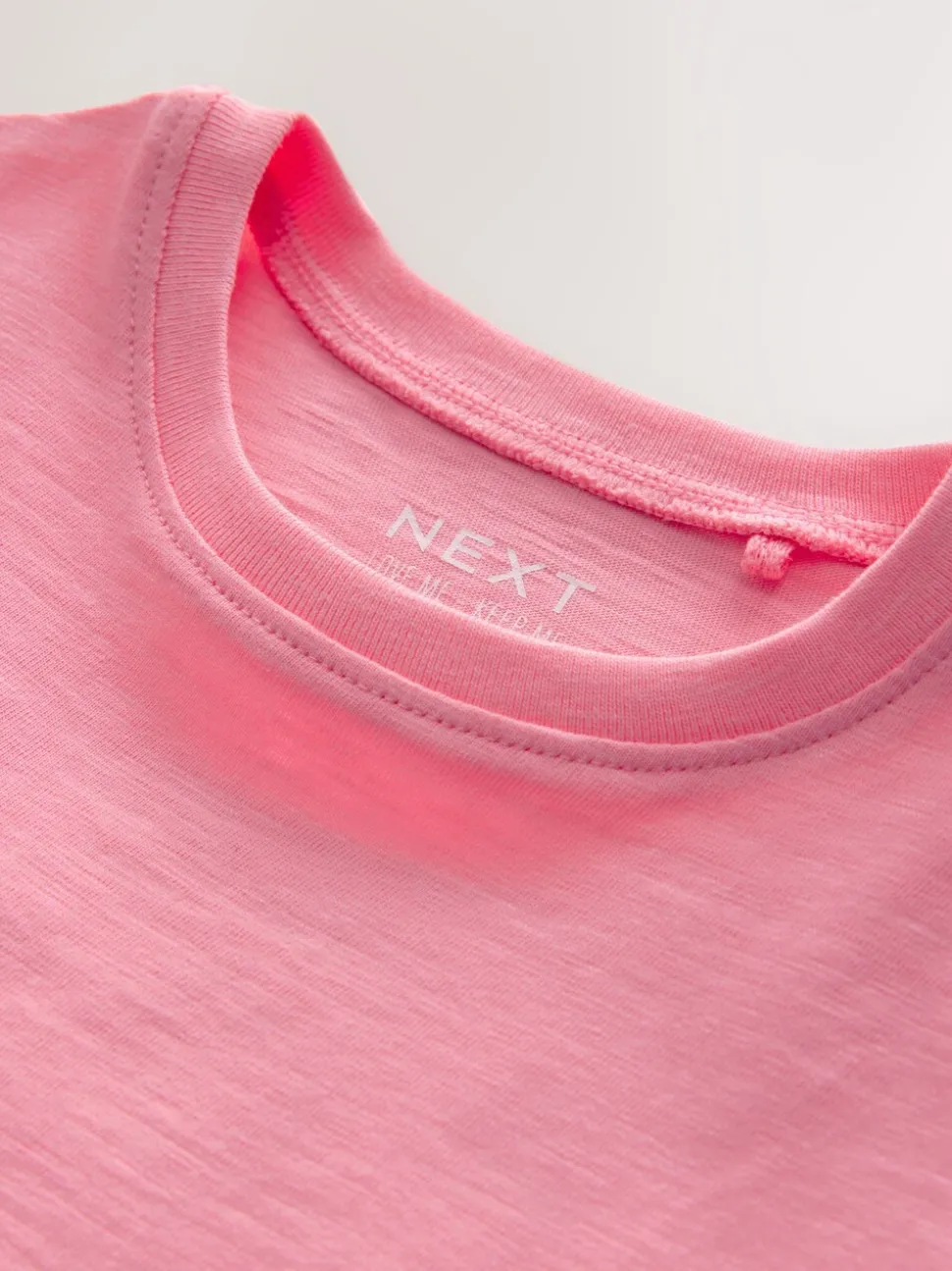 Roze - 100% katoenen T-shirt met korte mouwen en madeliefjesprint (3mnd -7jr)