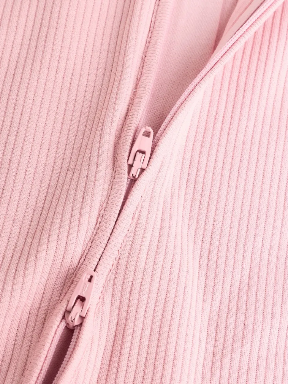 Roze - Babypyjama's met tweewegrits (0-2jr)