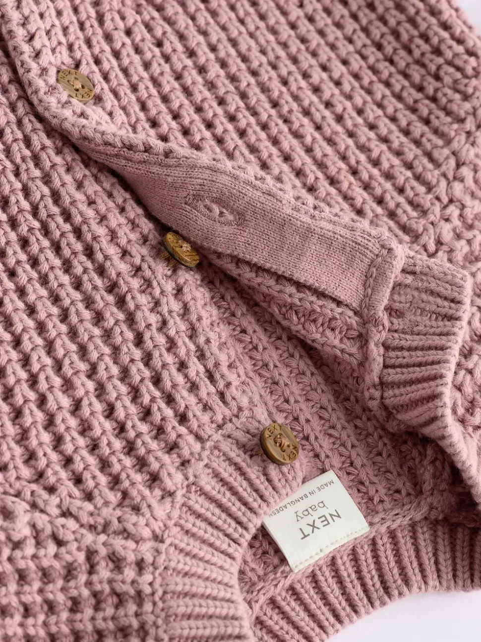 Roze - Gebreid babyvestje met geborduurde slogan op de rug (0mnd-2jr)