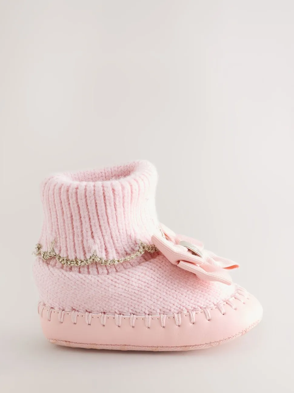 Roze - Gebreide padderslaarsjes met geschulpte rand voor babymeisjes met strik