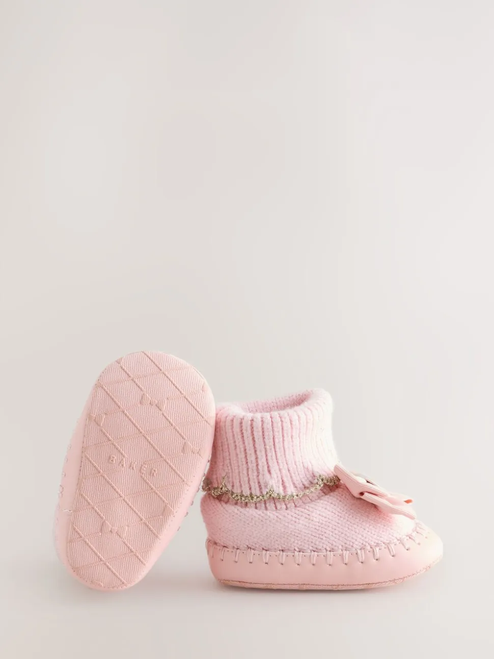 Roze - Gebreide padderslaarsjes met geschulpte rand voor babymeisjes met strik