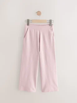 Roze - Jersey broek met wijde pijpen (3-16 jr)