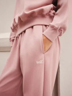 Roze - self. joggingbroek met wijde pijpen