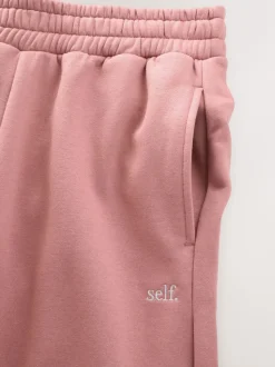 Roze - self. joggingbroek met wijde pijpen