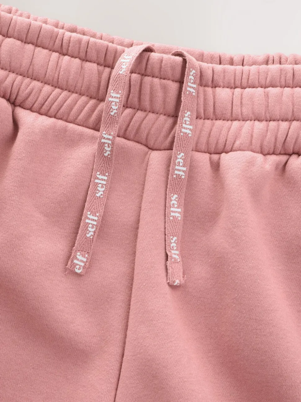 Roze - self. joggingbroek met wijde pijpen