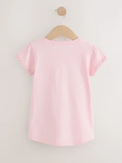Roze - T-shirt met zakje en madeliefjesprint (1,5-16 jr)