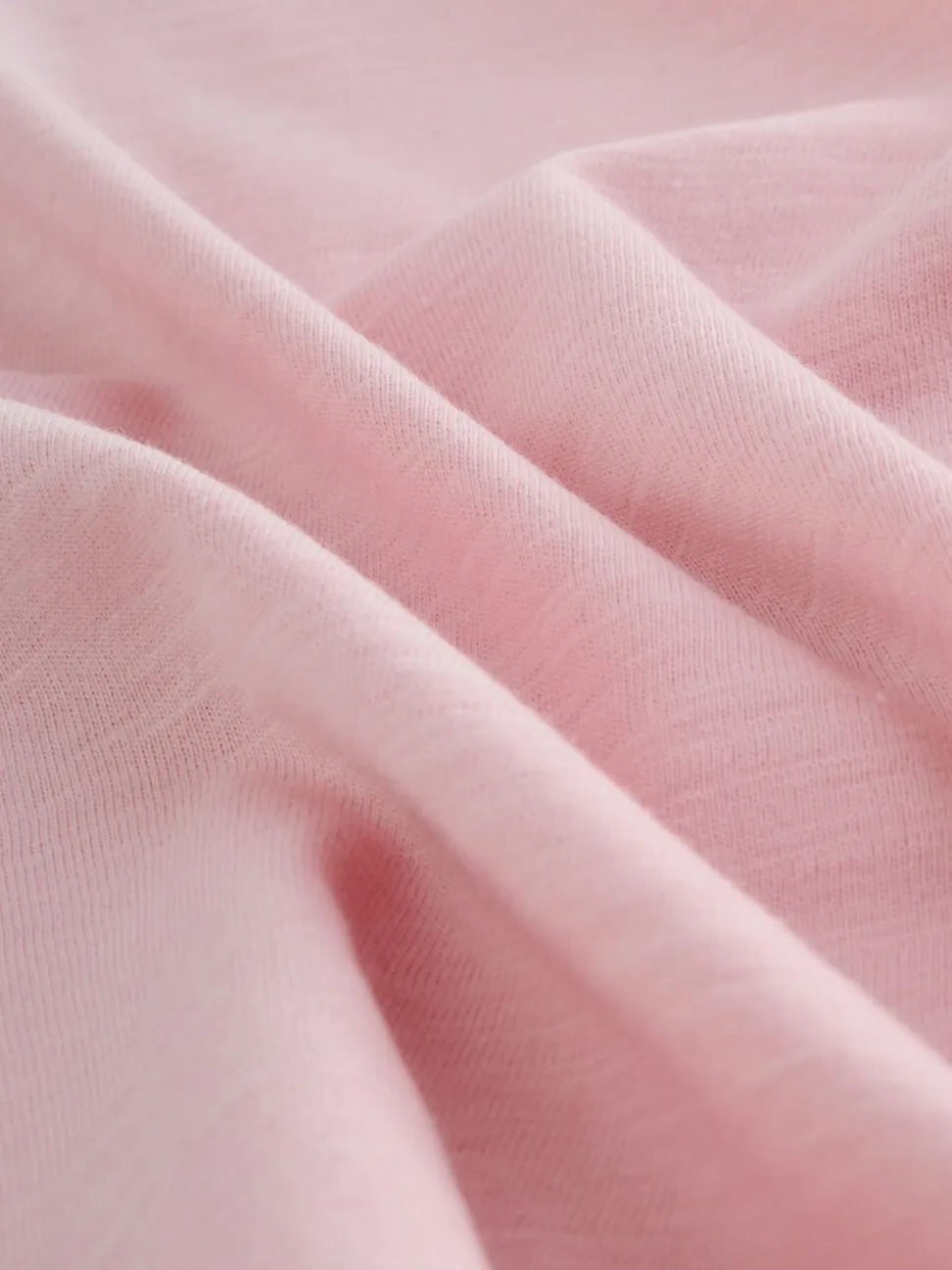 Roze - T-shirt met zakje en madeliefjesprint (1,5-16 jr)