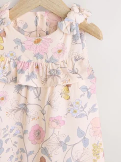 Roze bloemen - Babyromper met lange pijpen (0 mnd - 3 jr)