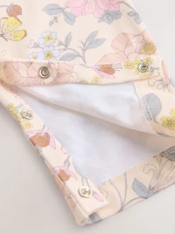 Roze bloemen - Babyromper met lange pijpen (0 mnd - 3 jr)