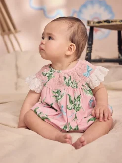 Roze bloemen - Cath Kidston 100% katoenen babyrompertje met print en broderie