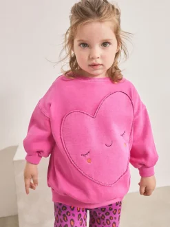 Roze dierenprint met hartjes - Set van sweatshirt en uitlopende legging (3mnd -7jr)