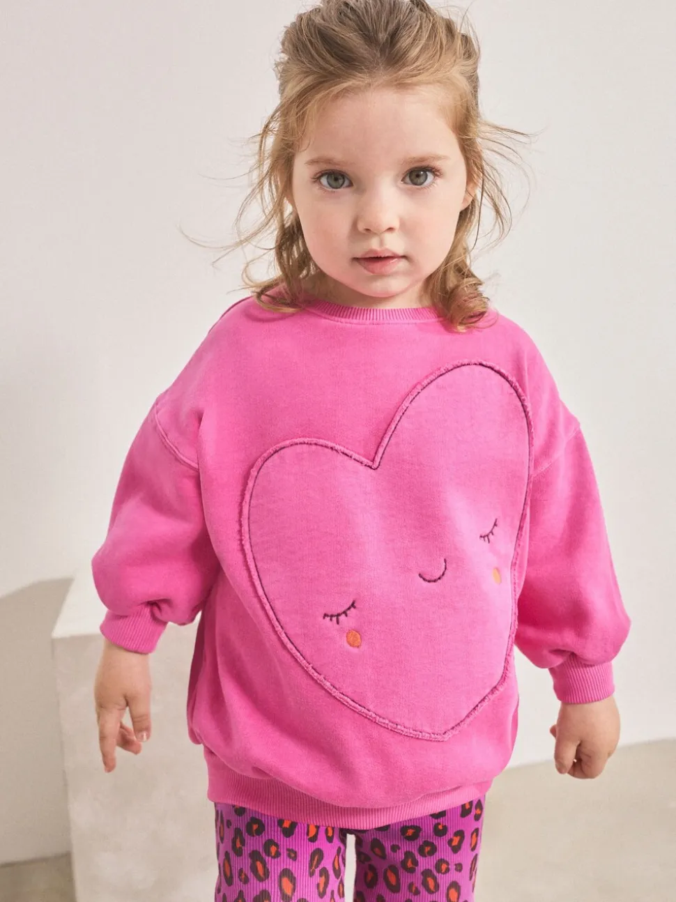 Roze dierenprint met hartjes - Set van sweatshirt en uitlopende legging (3mnd -7jr)