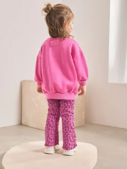 Roze dierenprint met hartjes - Set van sweatshirt en uitlopende legging (3mnd -7jr)