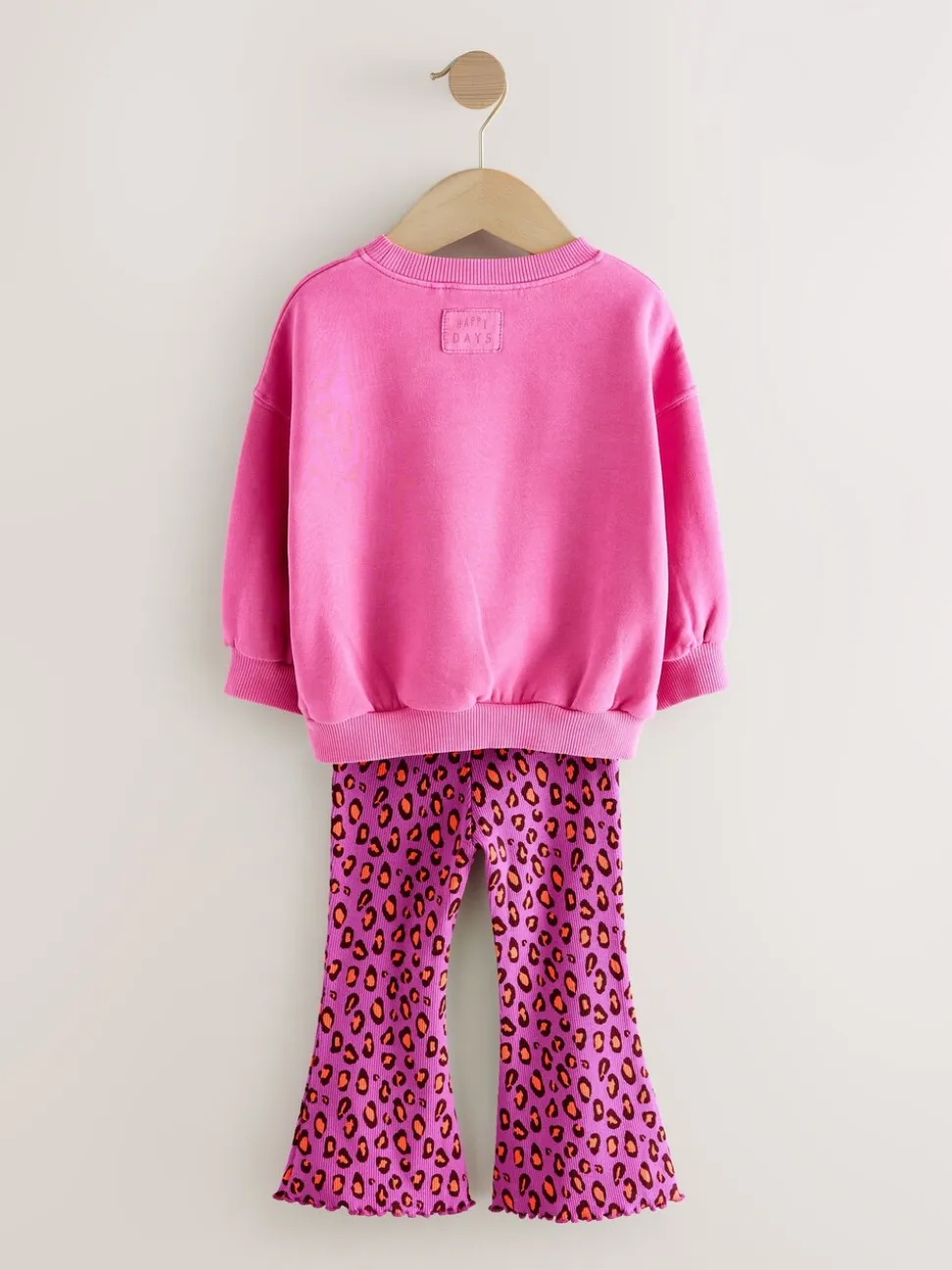 Roze dierenprint met hartjes - Set van sweatshirt en uitlopende legging (3mnd -7jr)