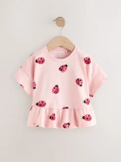 Roze lieveheersbeestje - T-shirt met peplum en korte mouwen (3mnd -7jr)
