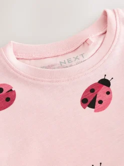 Roze lieveheersbeestje - T-shirt met peplum en korte mouwen (3mnd -7jr)