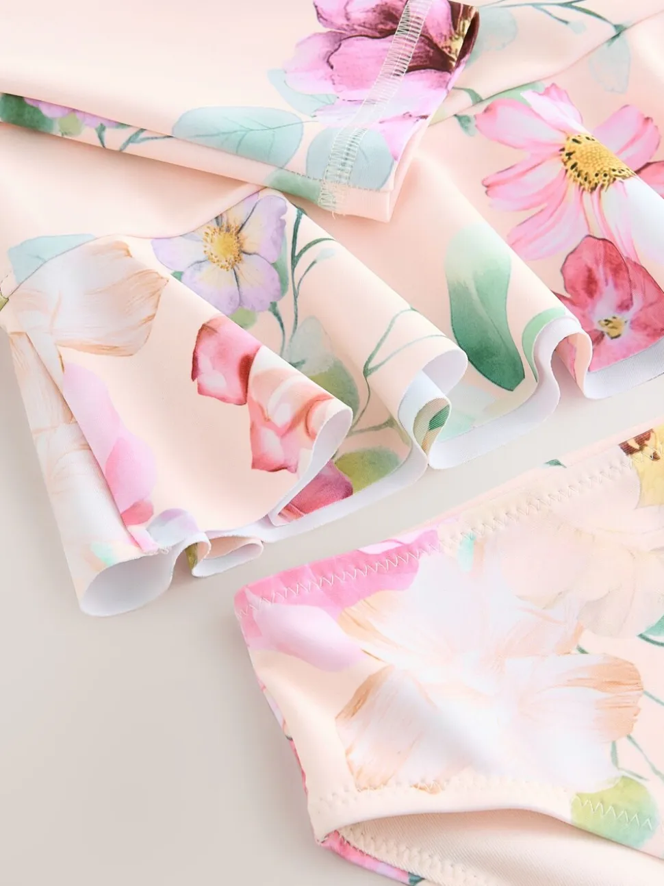 Roze met bloemenprint - Zonbeschermende zwemset (3 mnd-7 jr)
