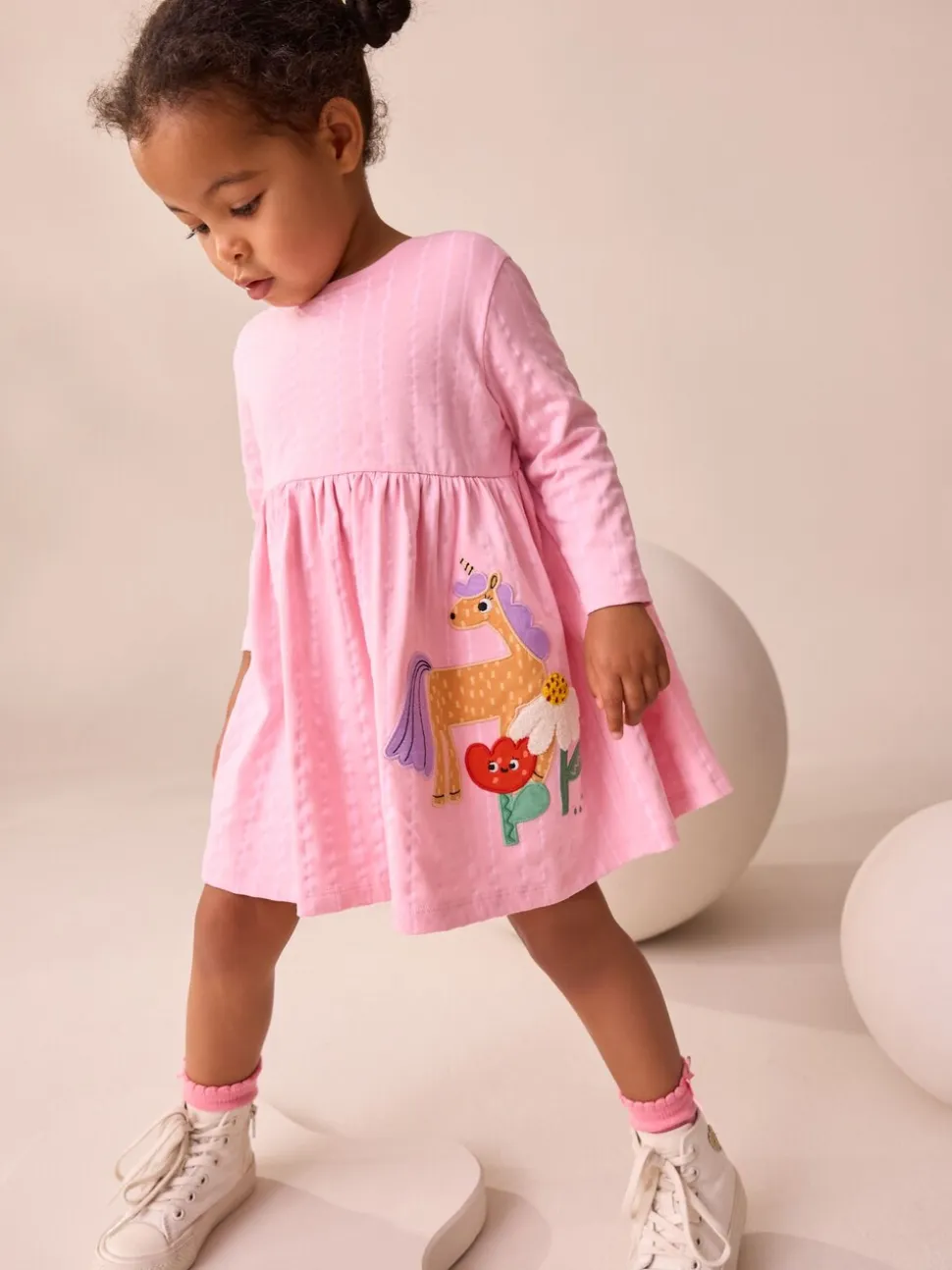 Roze met eenhoornprint - Jurk met lange mouwen en versiering (3mnd -7jr)