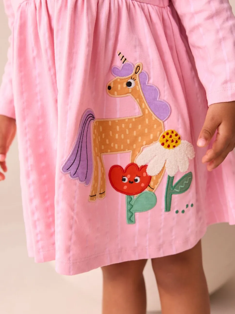 Roze met eenhoornprint - Jurk met lange mouwen en versiering (3mnd -7jr)