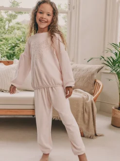 Roze met hart van lovertjes - Behaaglijke fleece pyjama (9 mnd-16 jr)