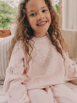Roze met hart van lovertjes - Behaaglijke fleece pyjama (9 mnd-16 jr)