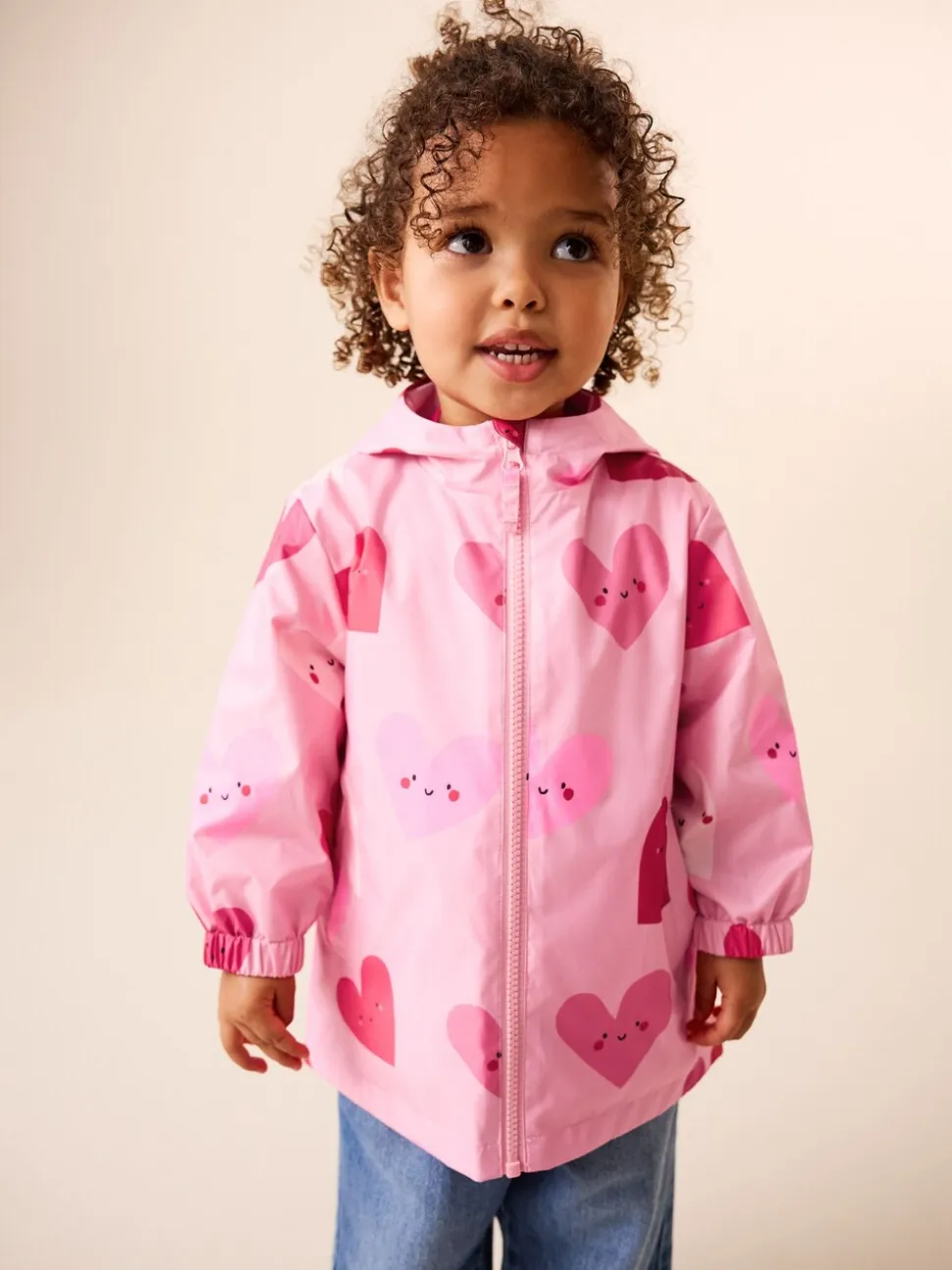 Roze met hartjesprint - Regenbestendig jack met print (3mnd-7jr)