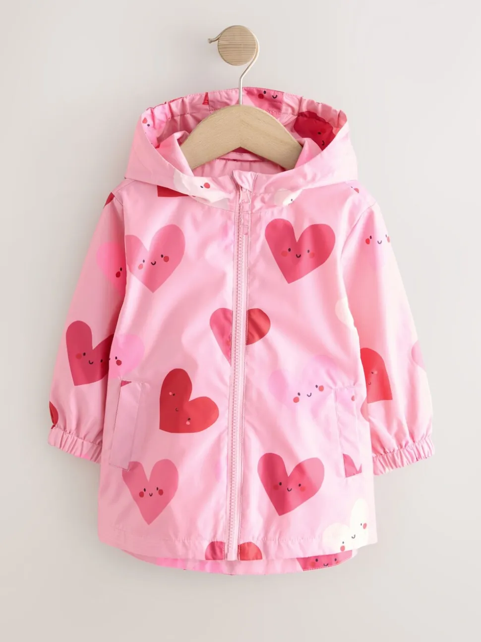 Roze met hartjesprint - Regenbestendig jack met print (3mnd-7jr)