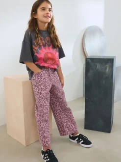 Roze met luipaardprint - Jeans met wijde pijpen (3-16 jr)