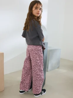 Roze met luipaardprint - Jeans met wijde pijpen (3-16 jr)