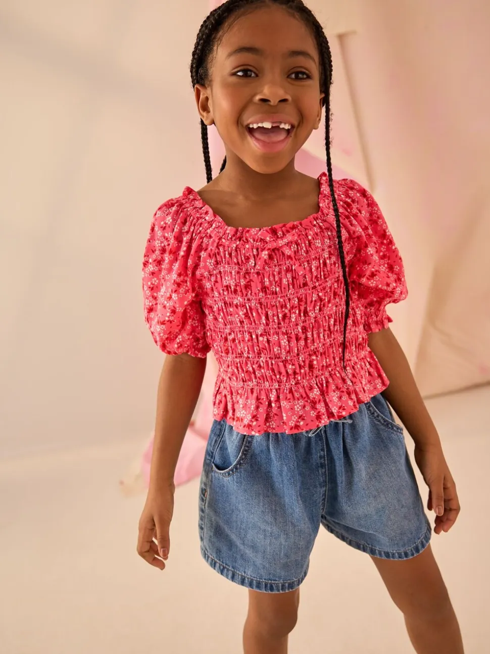 Roze met vrolijke print - Gesmokte blouse (3-16jr)