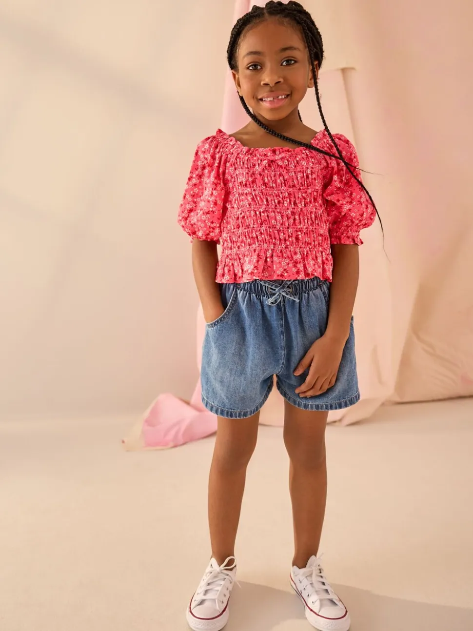 Roze met vrolijke print - Gesmokte blouse (3-16jr)