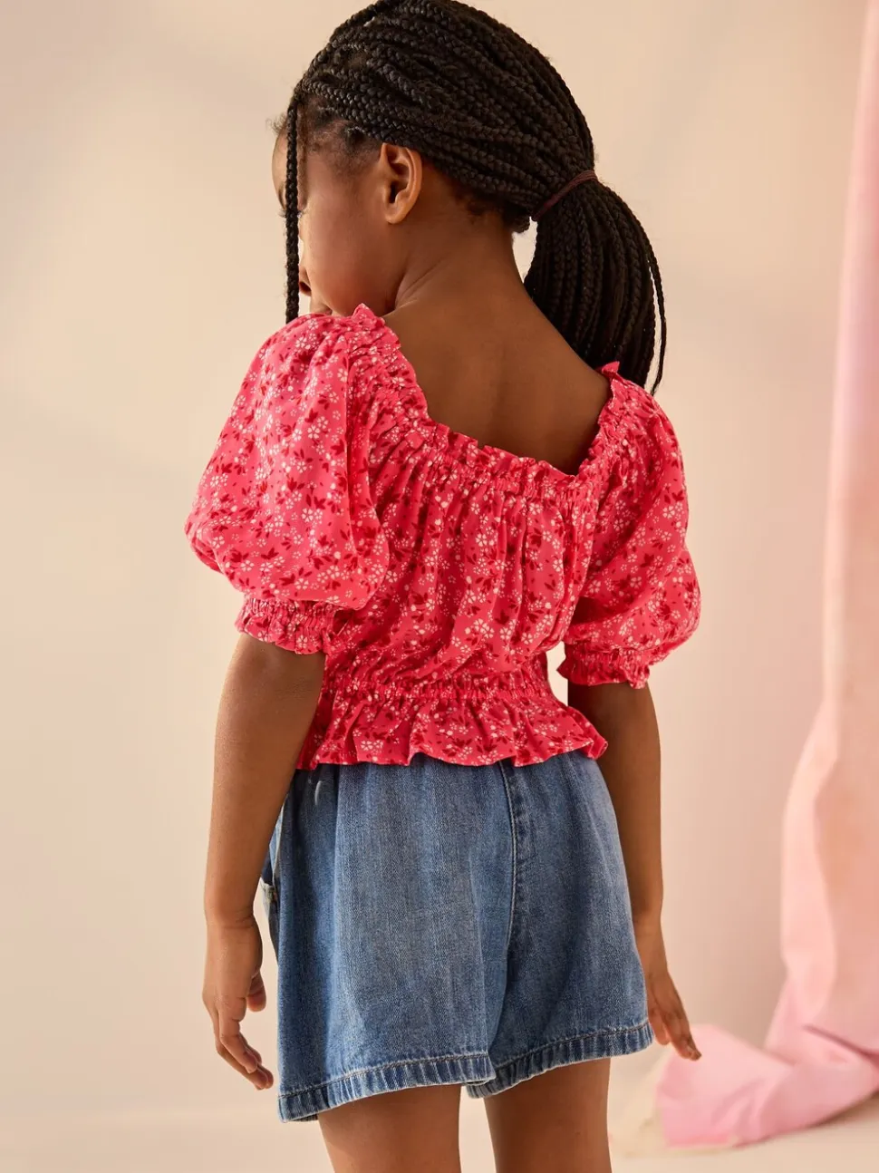 Roze met vrolijke print - Gesmokte blouse (3-16jr)