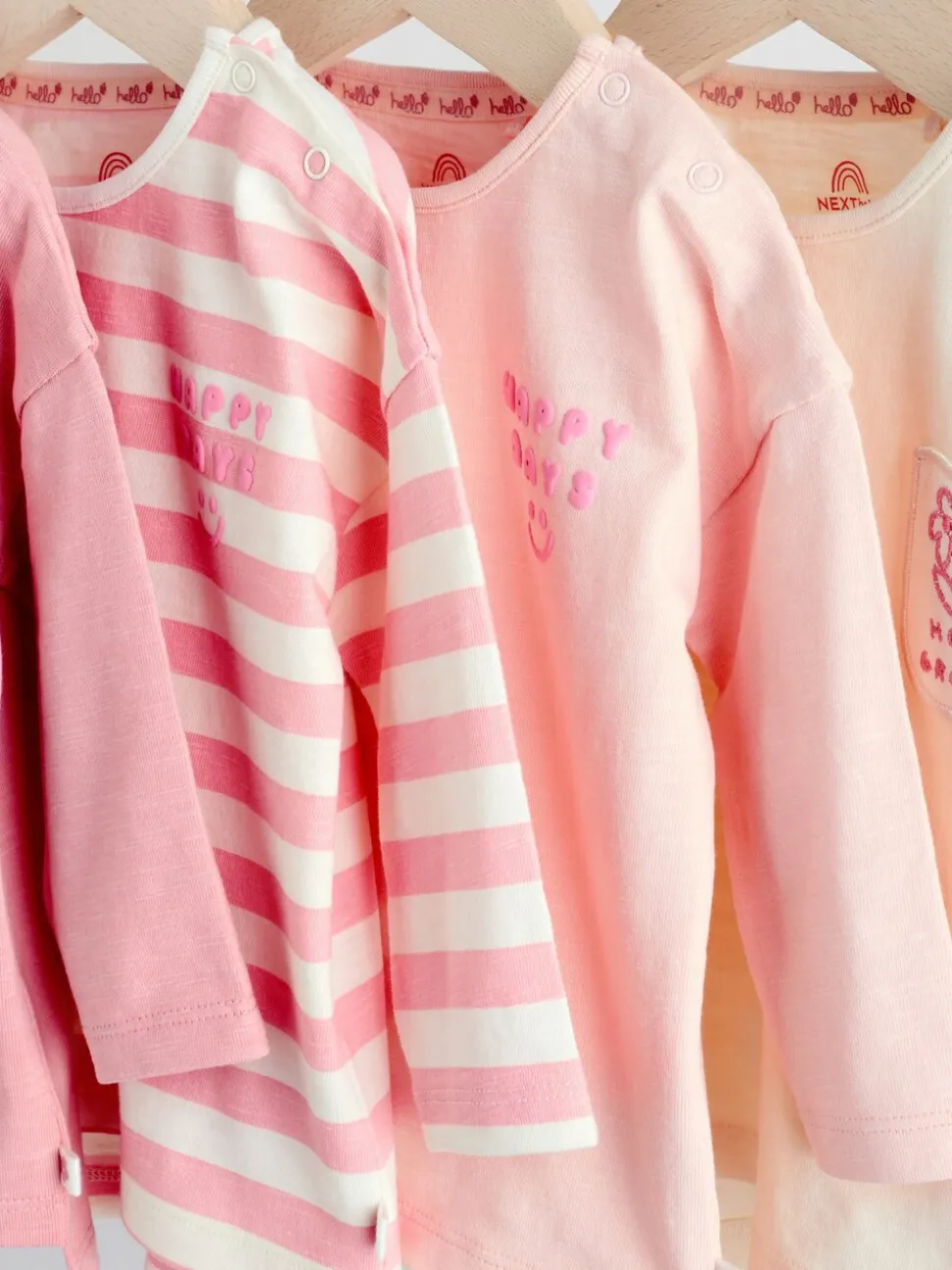 Roze Strepen/Slogan - Verpakking van 4 Baby Tops met Lange mouwen (0mnd -2jr)