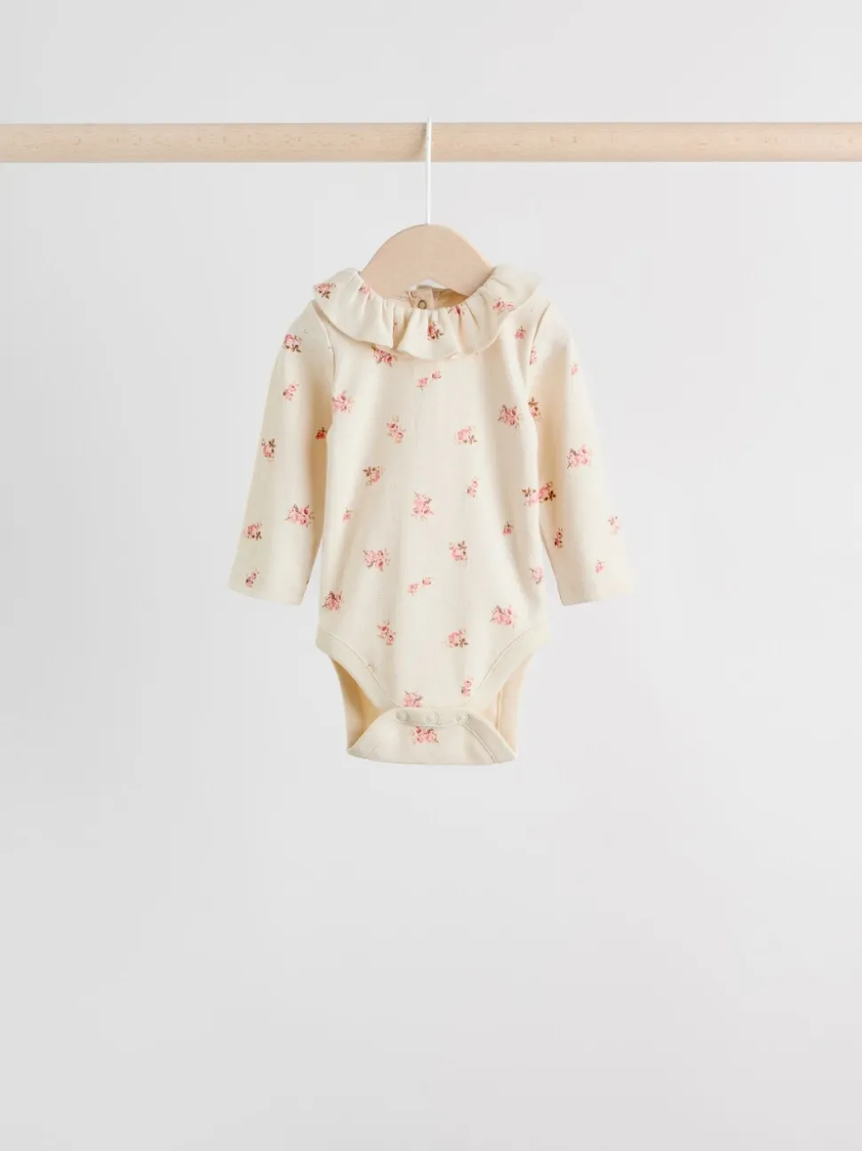 Roze/crème/bruin met fijne bloemetjesprint - Verpakking van 4 babyrompers met lange mouwen en ruches (0mnd-2jr)