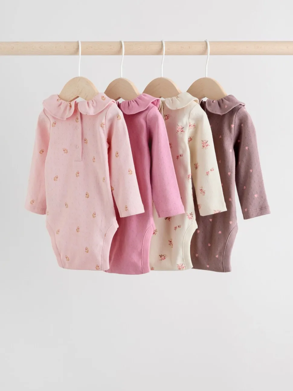 Roze/crème/bruin met fijne bloemetjesprint - Verpakking van 4 babyrompers met lange mouwen en ruches (0mnd-2jr)