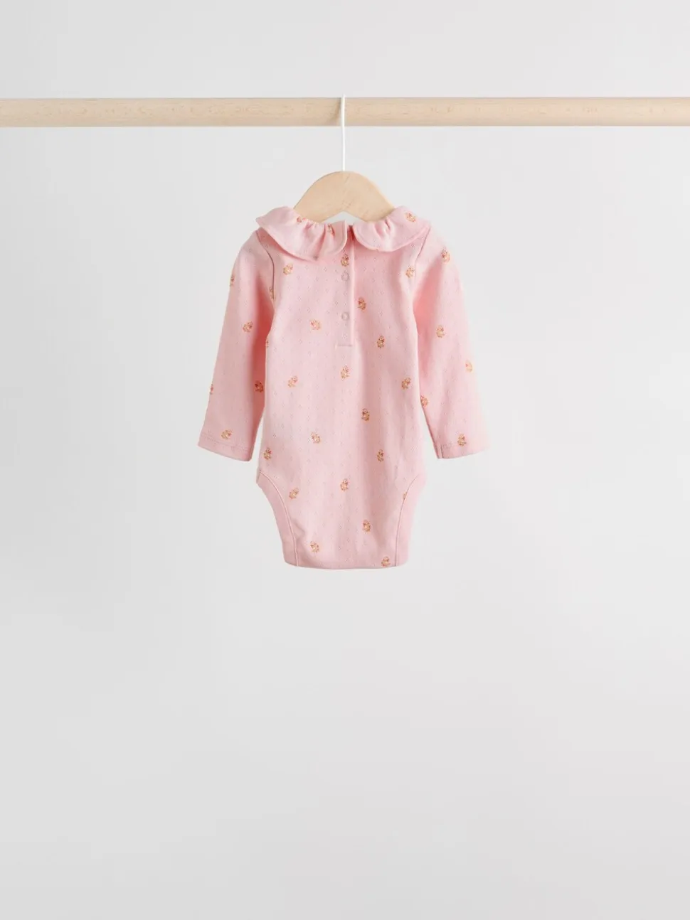 Roze/crème/bruin met fijne bloemetjesprint - Verpakking van 4 babyrompers met lange mouwen en ruches (0mnd-2jr)