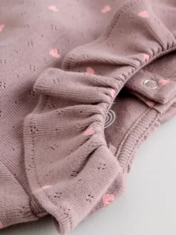 Roze/crème/bruin met fijne bloemetjesprint - Verpakking van 4 babyrompers met lange mouwen en ruches (0mnd-2jr)