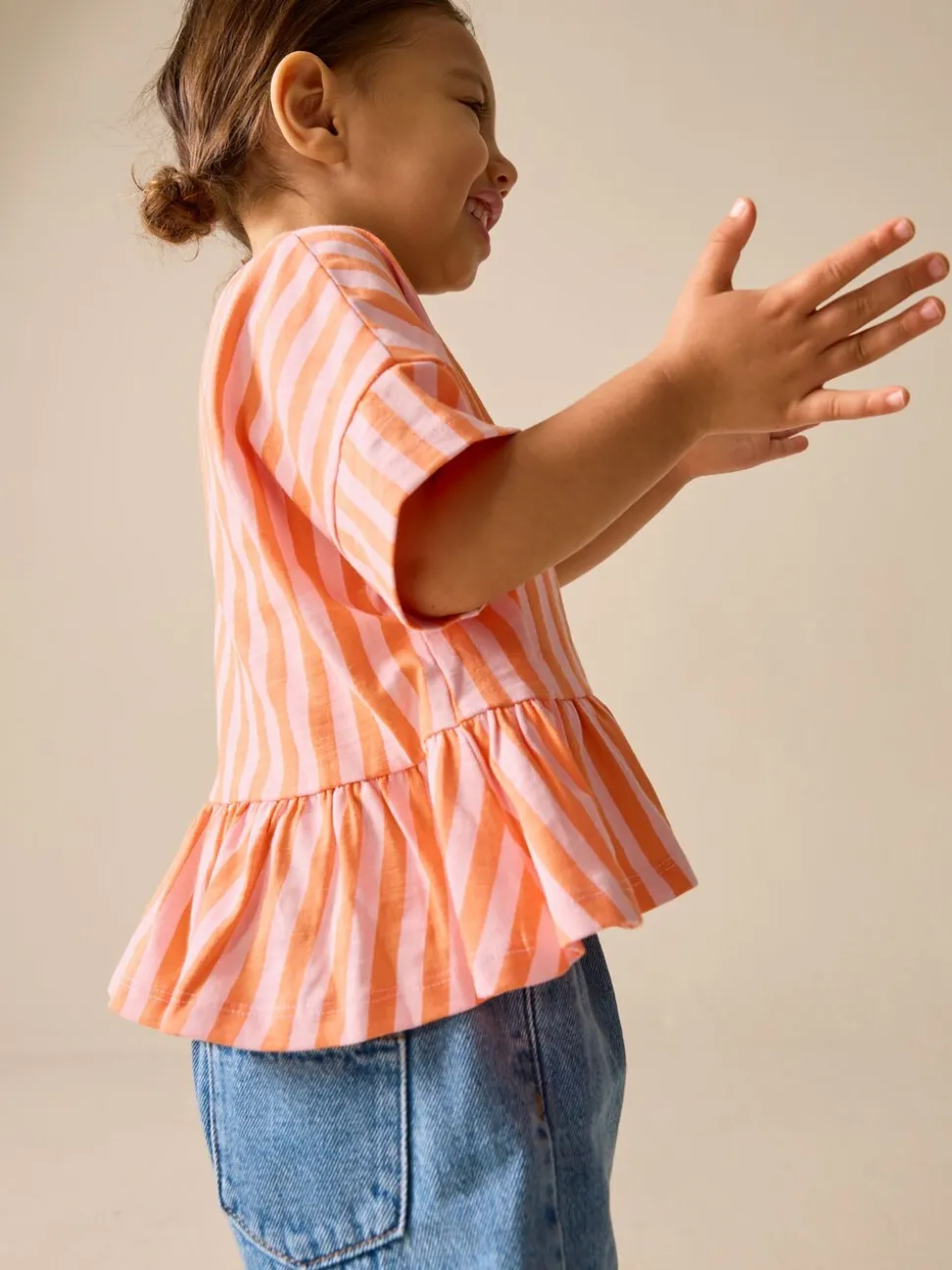 Roze/oranje gestreept - T-shirt met peplum en korte mouwen (3mnd -7jr)