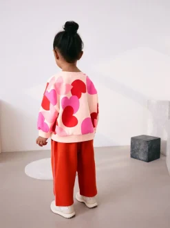 Roze/rood met hart - Set van sweatshirt en joggingbroek met rechte wijde pijpen (3mnd -7jr)