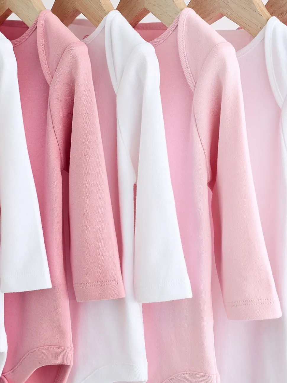 Roze/wit - Onmisbare rompertjes met lange mouwen
