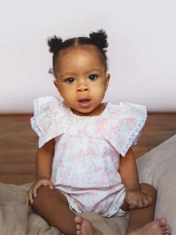 Roze/wit - The Little Tailor Mousseline babyplaysuit van 100% katoen