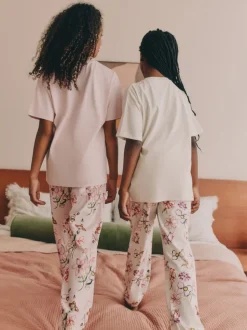 Roze/wit met bloemenprint - Verpakking van 2 pyjama's met joggingbroek (3 - 16 jr)