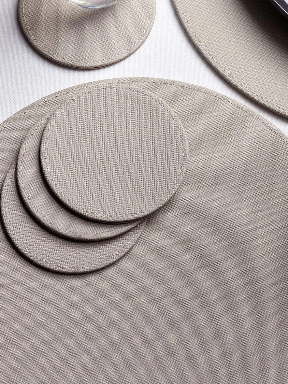 Set van 4 omkeerbare placemats en onderzetters van imitatieleer