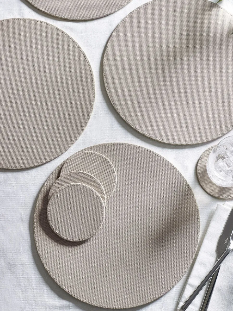 Set van 4 omkeerbare placemats en onderzetters van imitatieleer