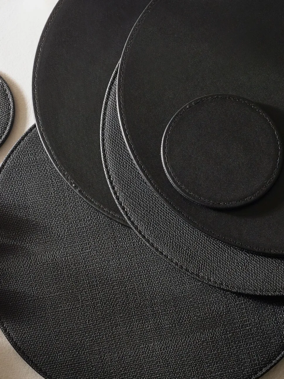 Set van 4 omkeerbare placemats en onderzetters van imitatieleer