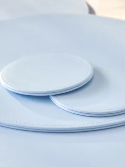 Set van 4 omkeerbare placemats en onderzetters van imitatieleer