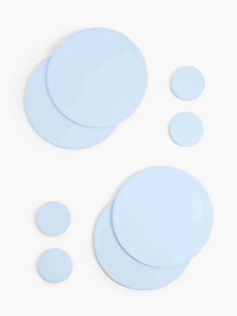 Set van 4 omkeerbare placemats en onderzetters van imitatieleer