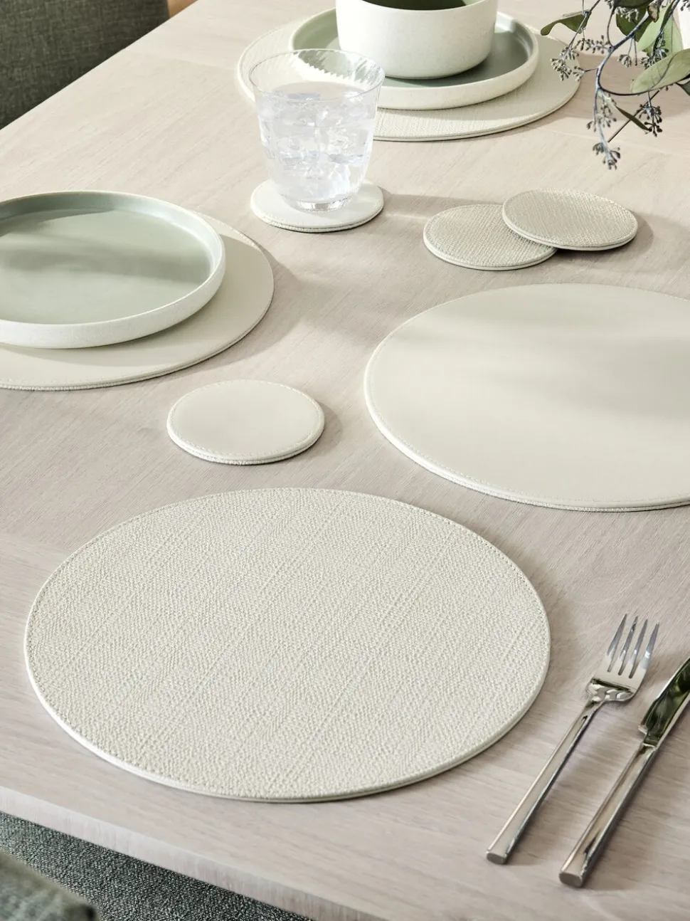 Set van 4 omkeerbare placemats en onderzetters van imitatieleer